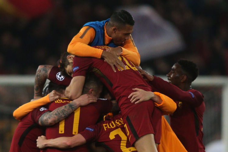 Roma players celebrate